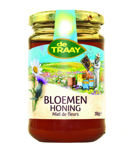 afbeelding van bloemen honing vloeibaar